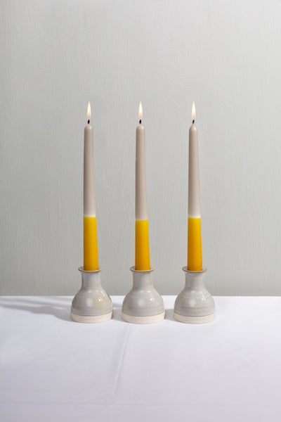 Ochre yellow dip dye taper candles made with vegan wax. 