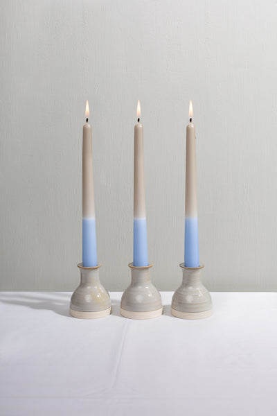 Pale blue dip dye tapered dinner candles. Made in England. Vegan wax.