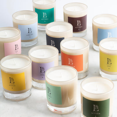 Twelve botanical scented candles inspired by the twelve months. Hand-poured in England. Sustainably made.