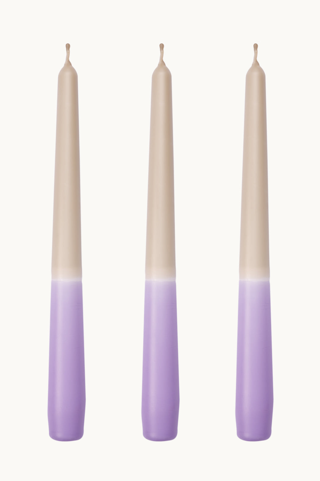 Pastel lilac purple dip dyed dinner candles. Taper candle trio made in England.