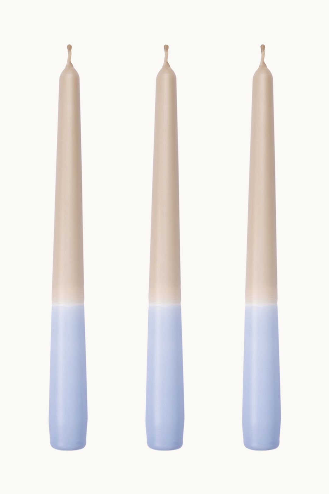 Pastel blue taper candles. Dip dye dinner candles made in the UK. 100% vegan, clean burning wax.