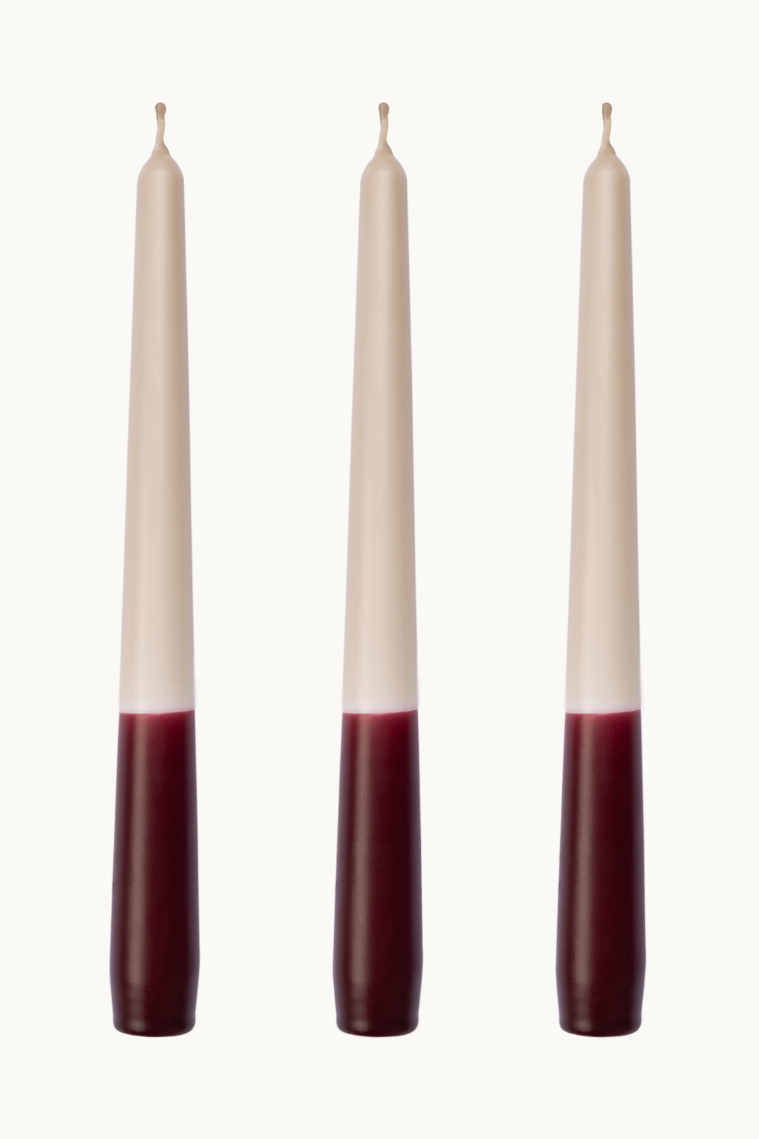 Burgundy red dip dye taper dinner candles. Made in England.