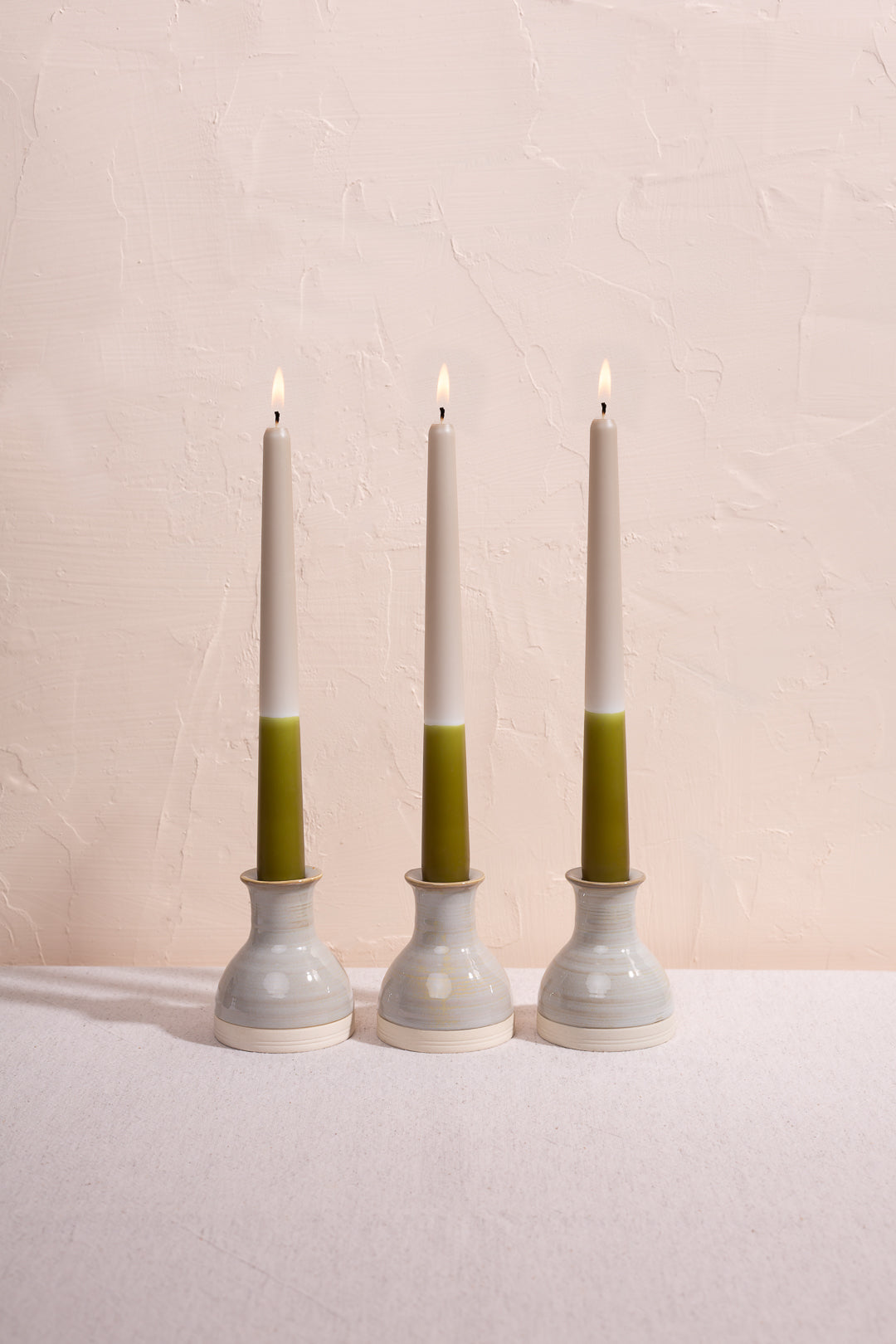 Forest moss green tapered candles. Colourful dinner candles made in England. Dip dyed by hand.