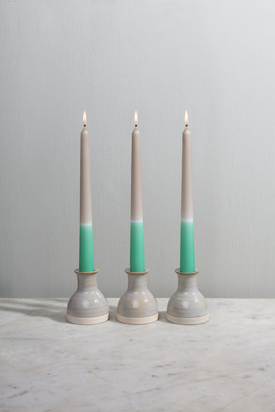 Pale green tapered dinner candles. Dip dyed by hand in England. Vegan wax.